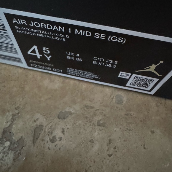 Air Jordan 1 Mid SE (GS) Black and Metallic/Silver Sneakers